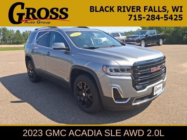 2023 GMC Acadia SLE in Sterling Metallic — front three-quarter view
