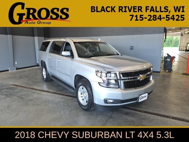 2018 Chevrolet Suburban LT in Silver Ice Metallic — front three-quarter view