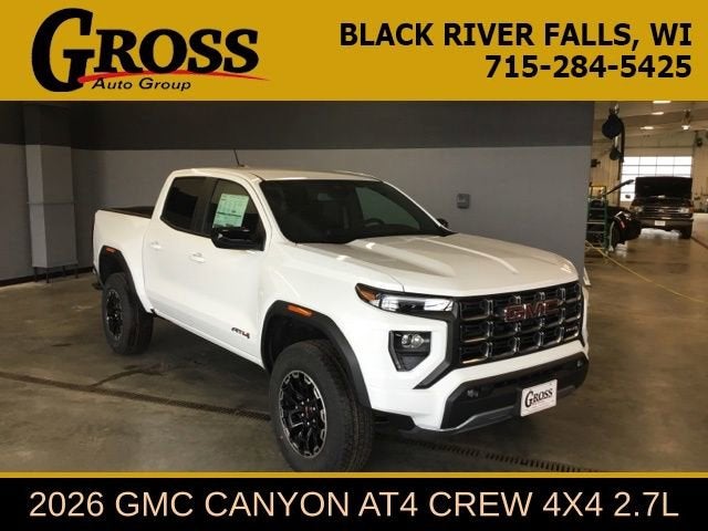 2026 GMC Canyon AT4 in Summit White — front three-quarter view